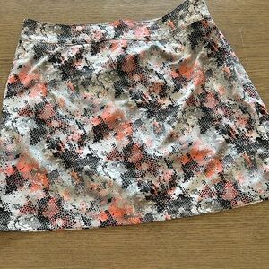 Izod Women's A-Line Skort - Black, Gray, and Orange Abstract